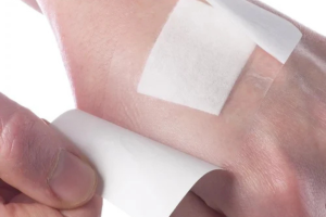 Transparent film with absorbent pad